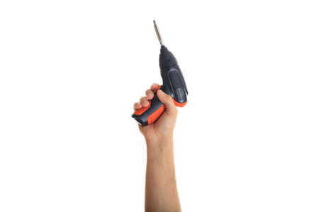 Man holding an electric screwdriver on white backgroundの写真素材