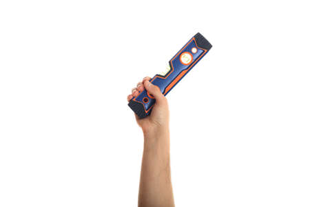 Spirit level on white background. Hand holding a spirit level