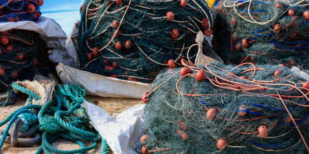 Stacks of fishing nets at Marsaxlokk port, Malta island