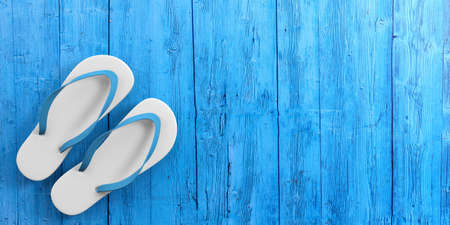 Summer beach holidays. Flip flops on blue wooden background, top view, copy space. 3d illustrationの写真素材