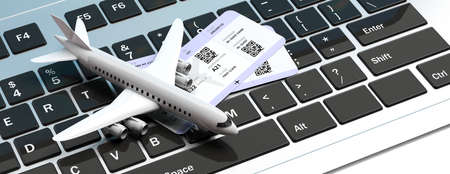 Online booking and checkin. Airplane and two boarding passes, on computer keyboard. 3d illustrationの写真素材