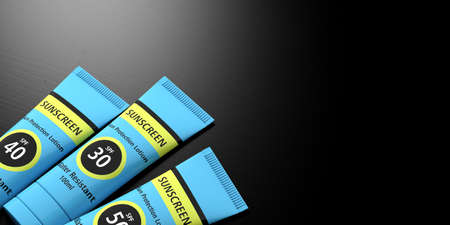 Sun tan protection. Sunscreen lotion tubes on black background, copy space. 3d illustrationの写真素材