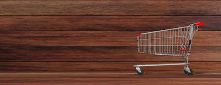 Shopping cart, empty, on wooden background, banner, copy space, side view. 3d illustrationの写真素材