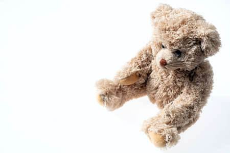 Toys present concept. Teddy bear isolated with copy space on white backgroundの写真素材