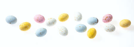 Season holidays concept. Colorful Easter eggs, cut out and isolated on white background, banner,