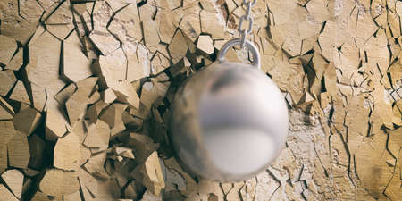 Freedom concept. Wrecking ball hitting and breaking a golden wall. 3d illustrationの写真素材