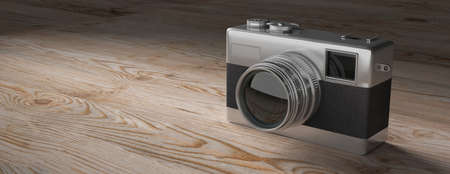 Vintage concept. Isolated retro camera on white wooden background, copy space, banner, 3d...