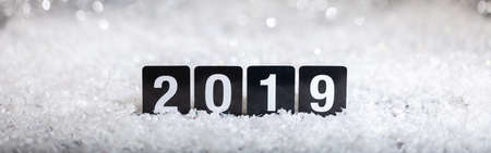 2019, new year on snow, abstract bokeh lights background, banner