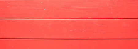 Wood board red color background, texture. Wooden planks, painted, floor or wall, bannerの写真素材