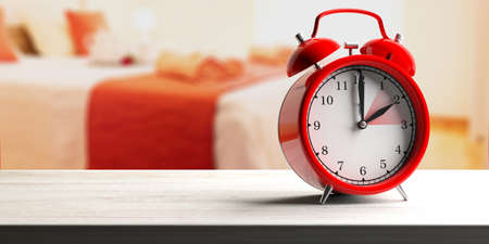 European daylight saving time end. Red alarm clock on wooden desk, blur bedroom background, banner,...
