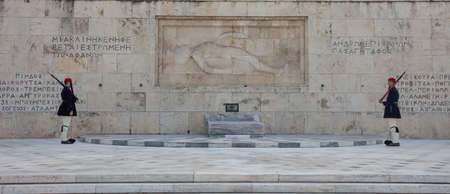 February 19, 2019. Athens Greece, Syntagma square, greek parliament. Guards wearing the traditional winter uniform, in front of unknown soldier tomb, bannerのeditorial素材