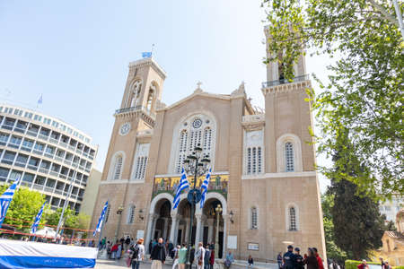 April 28, 2019. Athens, Greece. Mitropoli, Greek Orthodox Cathedral. People visit and admire a celebration day the historic building of Panagia Annunciation church.のeditorial素材