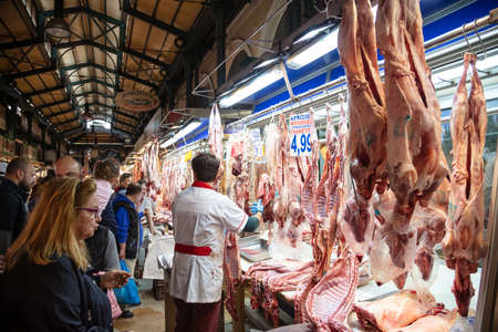 April 28, 2019. Athens, Greece. Greek meat market concept. Whole and half certified lambs are sold, out of storeのeditorial素材