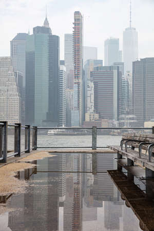 New York city skyline. Manhattan skyscrapers and Hudson river. Panoramic view, buildings reflections...