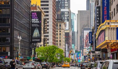 USA, New York, Times square. May 3, 2019. Broadway streets. High buildings, colorful neon lights,...