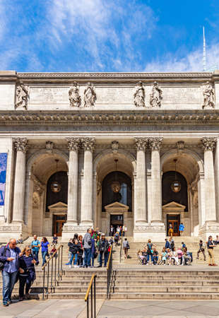 New York, USA. May 2, 2019. The New York Public Library entrance against blue sky background, sunny...