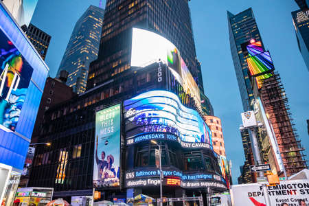 USA, New York, Manhattan. May 3, 2019. Downtown at night. Illuminated buildings, colorful neon...