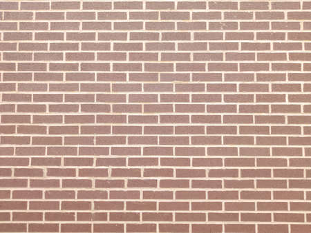 Brick wall background, texture. Red brown color bricks built wall, building facade, horizontal...