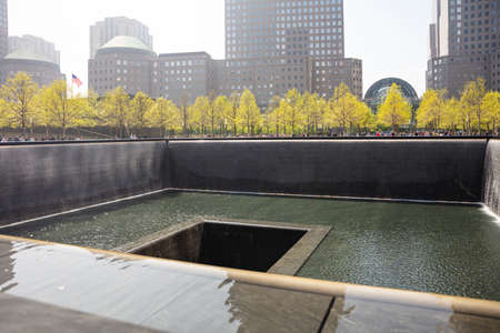 New York, USA. May 4, 2019. Manhattan. Ground Zero memorial structure, skyscrapers background