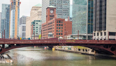 Chicago, Illinois. USA, Dearborn street bridge over river, high rise buildings background, spring dayの写真素材