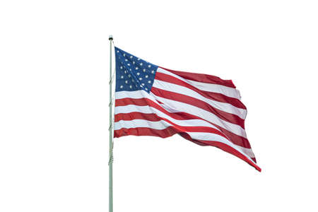 American flag on a pole waving, white background. US of America symbol sign isolated on whiteの写真素材