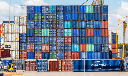 Rotterdam harbor, Netherlands. July 2nd, 2019. Logistics business. Stacked containers, and...