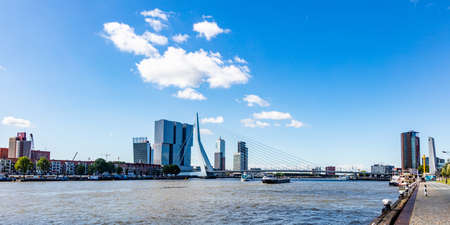 Rotterdam, Netherlands. July 2nd, 2019. Cityscape and Erasmus bridge, sunny day. Waterfront buildings at river Maasのeditorial素材