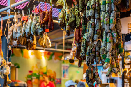 Rotterdam Netherlands, June 27, 2019. Sausages, meat products hanging in a store in Rotterdam markthalのeditorial素材