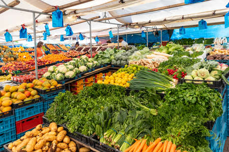 Rotterdam Netherlands, June 29, 2019. Fresh vegetables fruits and herbs for sale at a farmers openair market. Close up viewのeditorial素材