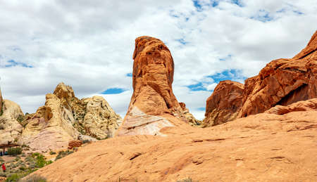 Valley of fire state park, Nevada USA. Red sandstone rock formations against blue sky with clouds background, sunny spring dayの写真素材