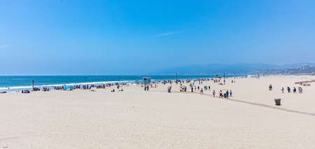 California USA. May 30, 2019. People on sandy Santa Monica beach. Pacific ocean coastline Los...