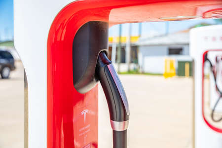 USA Oklahoma, May 13th, 2019. Electric cars Tesla charging station, closeup view. Sunny spring day...