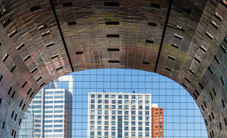 Rotterdam, Netherlands. June 27, 2019. View of buildings and blue sky from inside Markthal Market,のeditorial素材
