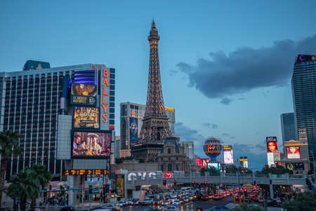 Las Vegas Nevada, USA. May 27, 2019. Las vegas strip aerial view at dusk. Colorful neon signs and ads, crowd and cars, cloudy skyのeditorial素材