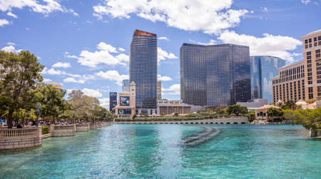 Las Vegas Nevada, USA. May 27, 2019. Bellagio pool fountain and buildings in the morning. Sunny spring day, blue skyのeditorial素材