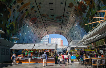 Rotterdam, Netherlands. June 27, 2019.  Market Markthal interior view, colorful ceiling and people shoppingのeditorial素材