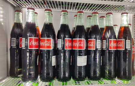 Santa Fe , New Mexico, USA. May 13, 2019. Refrigerator filled with coca cola bottles. Soft drink 500 ml of pleasure!のeditorial素材