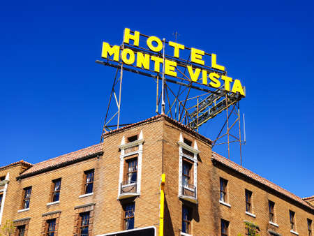 Flagstaff Arizona, USA, May 25 2019. Monte Vista hotel old fashioned building facade with red bricks, clear blue sky background. U.S. Route 66.のeditorial素材