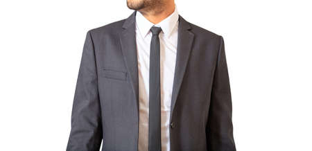Male body part young businessman in gray suit and tie standing isolated cutout, against white...