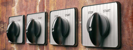 Start stop switch retro old round on grunge wall background, banner. Industrial turning on off...