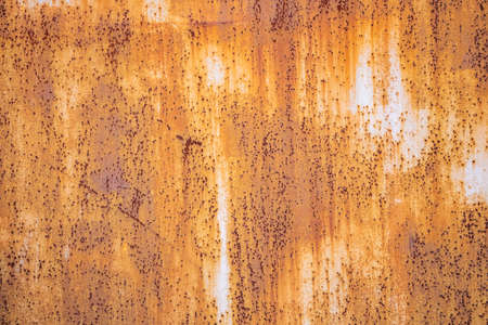 Metal rusty background texture. Heavy industrial steel plate corroded and peeled, empty surface,...
