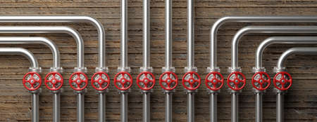 Oil and gas industry. Pipelines and valves system, red wheels and concrete wall background, banner. 3d illustrationの写真素材