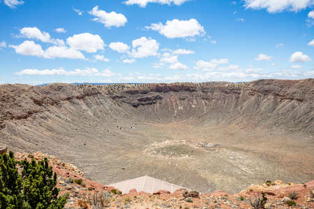 Winslow Arizona, US. May 23, 2019. Barringer Meteor crater, blue sky, sunny spring dayのeditorial素材