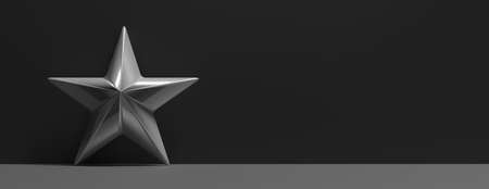 Silver star single against empty black wall background. Christmas interior room decoration concept, banner, copy space. 3d illustrationの写真素材