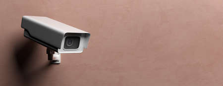 Surveillance CCTV Camera. Security cam against brown color wall background, banner, copy space. 3d illustrationの写真素材