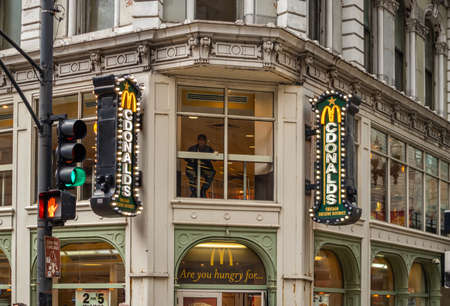 Chicago, Illinois, US. May 9, 2019: Mc Donalds fast food Restaurant in the city center, neon logo...