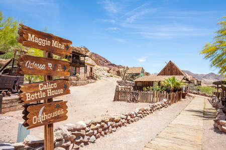 Calico ghost town California, USA. May 29, 2019. Directional sign arrows on wooden post in a sunny spring dayのeditorial素材
