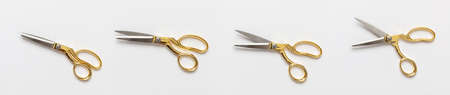 Cutting. Scissors collage set, gold and silver color isolated against white background, top view.