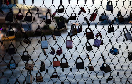 Rotterdam, Netherlands. June 29, 2019. Padlocks locks on love bridge. Blur background, closeup.のeditorial素材