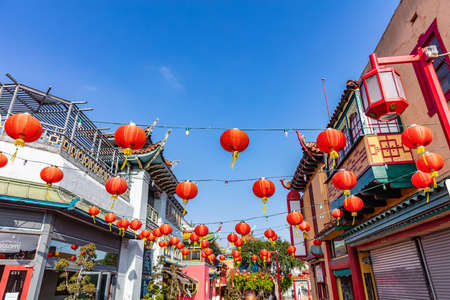 Los Angeles, California USA. June 1, 2019. LA Chinatown street, red chinese lanterns, blue clear sky background, low angle viewのeditorial素材